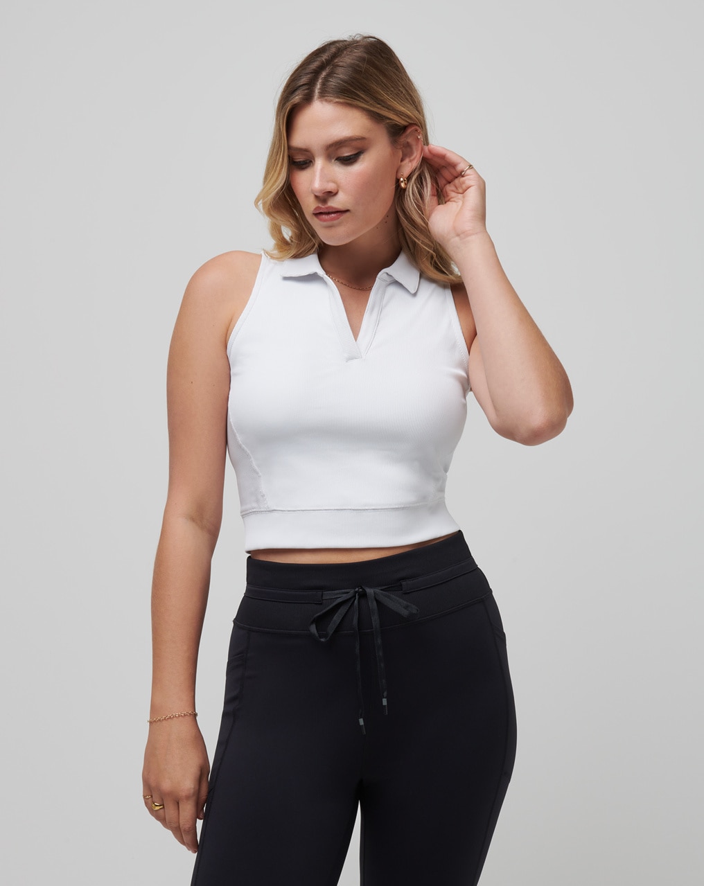 MOVEKNIT SLEEVELESS VNECK POLO 0